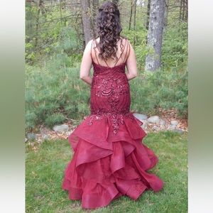 stunning wine colored dress adorned with sequins. Slightly altered down.